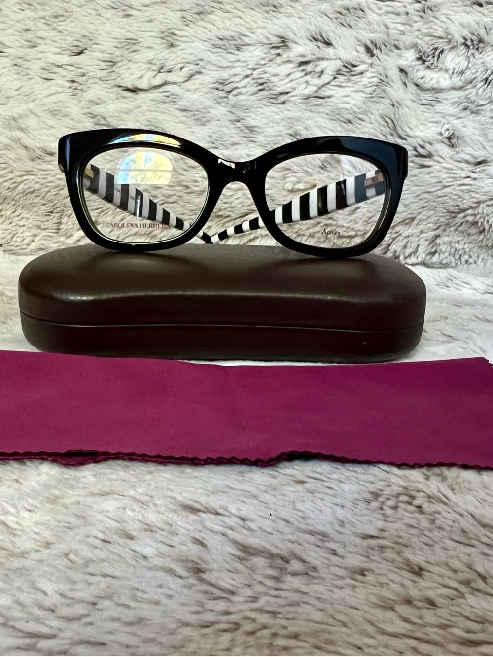 Carolina Herrera Black Cat-Eye Glasses with Striped Temples